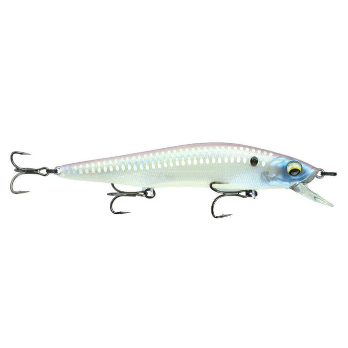 Clear close-up of a 6th Sense Provoke 106X Jerkbait fishing lure in pearlescent white with blue and silver accents, featuring three sharp treble hooks and detailed eye design.