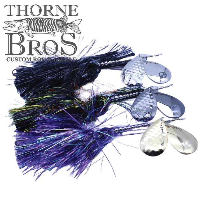 Angling Revolution "The One" 10/10 fishing lures with shiny silver spinner blades and colorful, iridescent skirts designed for musky fishing tackle at Thorne Bros.