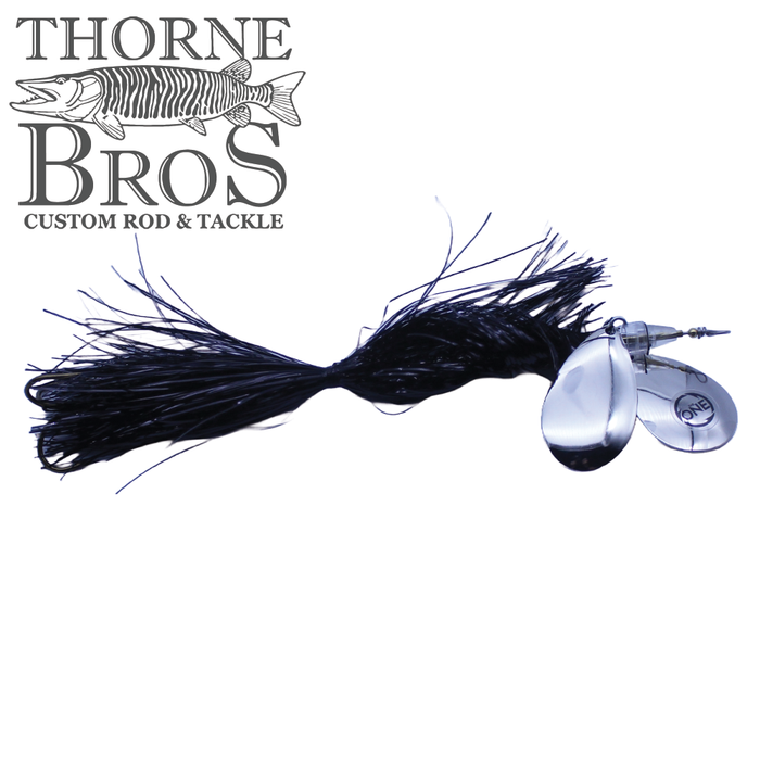 Angling Revolution "The One" 8/9 fishing lure with black skirt and silver spinner blades designed for musky fishing, featured alongside Thorne Bros custom rod and tackle logo.