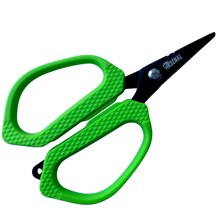 Green-handled scissors with black blades on a white background