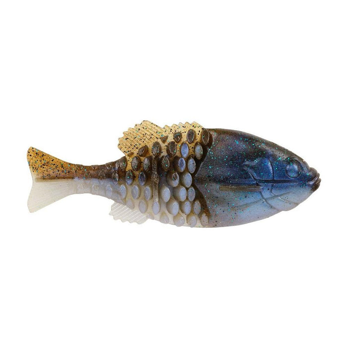 Soft plastic fishing lure shaped like a small fish with a blue and brown body and textured paddle tail, designed for use as Berkley PowerBait Gilly in fishing tackle.