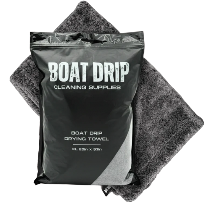 Boat Drip Drying Towel in black packaging displayed on a dark gray microfiber towel, designed for quick drying and cleaning of boats and fishing gear.