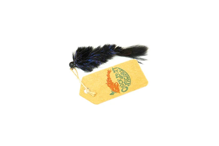 Chocklett Factory Leech Changer fishing lure with black and blue feathered body attached to a branded yellow tag, designed for musky fishing tackle and fly fishing gear.