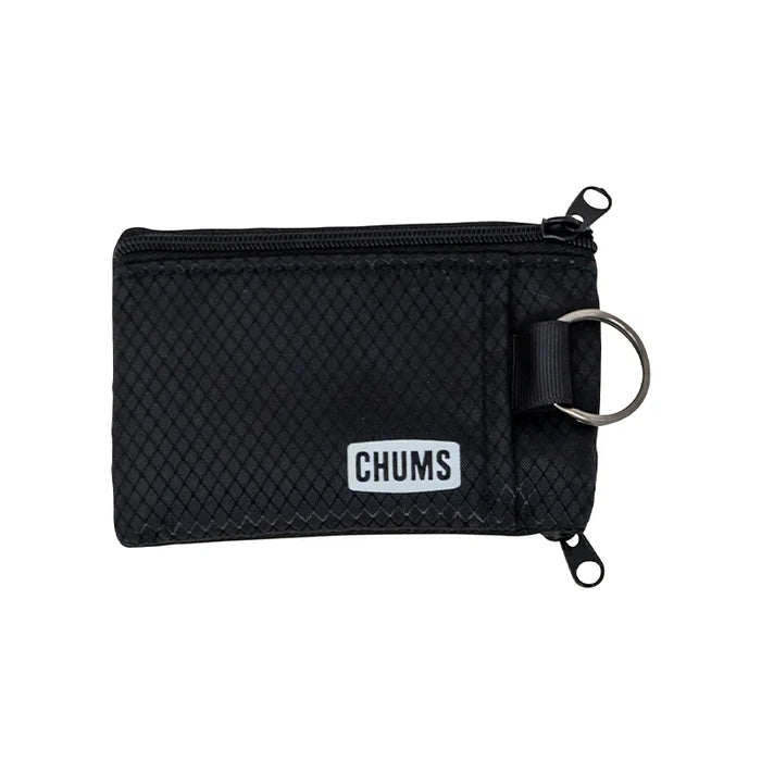 Chums Surfshorts Wallet in black with a textured fabric exterior, dual zipper compartments, and a metal key ring for secure storage and easy access.
