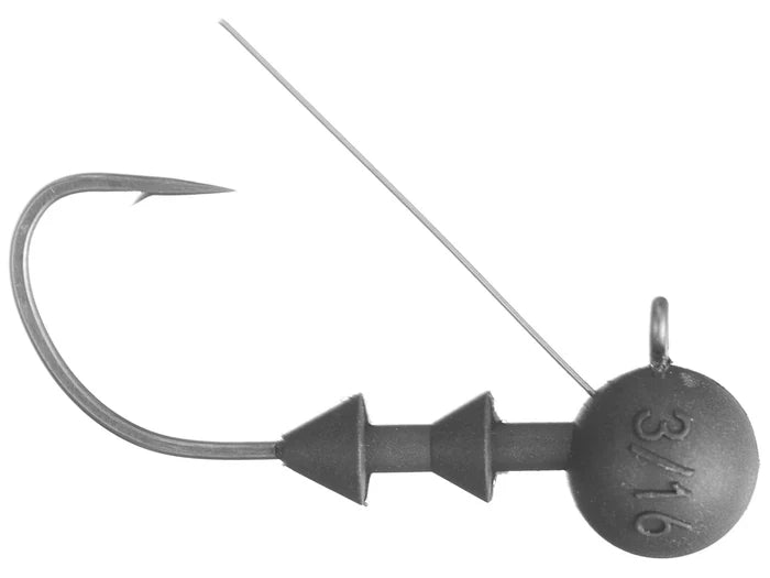 Close-up of a gray fishing jig head with a single sharp hook and a thin wire weed guard, labeled with 3/16 weight, identified as Cipher Tungsten Midstroll Ball Head for fishing tackle.