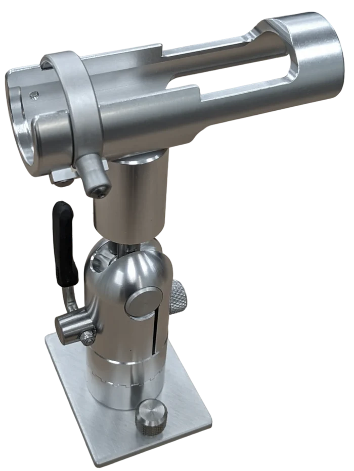 Cisco Short Cradle Rod Holder with Locking Ring Track mt. PN:PKSCC-CR, a silver metal fishing rod holder featuring a cradle design and adjustable locking mechanism, mounted on a sturdy base for secure positioning.