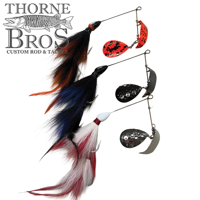 CJ'S Large Tandem Clicker fishing lure with three colorful feathered hooks and multiple metal spinning blades designed for musky fishing, displayed on a white background.