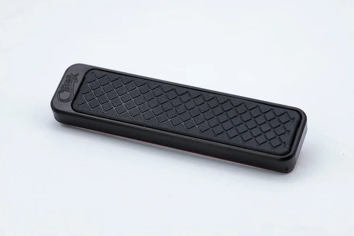Cling Tool Stick Mini in black with textured grip surface, designed for securely holding fishing tackle and accessories.