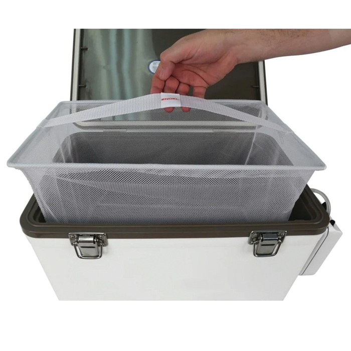 Hand holding the white mesh of Engel Live Bait Minnow Nets placed inside a white cooler with dark brown trim and silver latches, designed for fishing tackle and live bait storage.