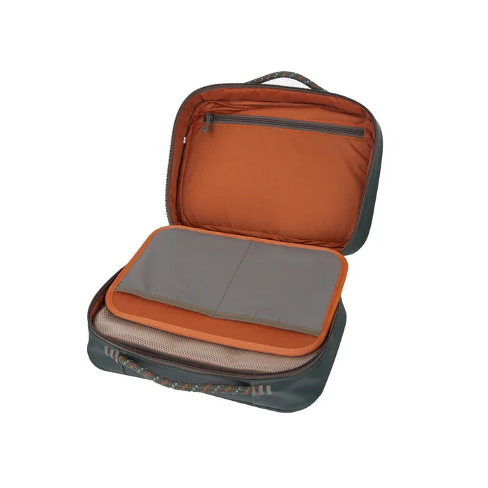 Open Fishpond Backwater Fly Tying Kit case showing orange interior with multiple compartments and padded sections for organizing fly tying tools and materials.