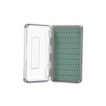 Clear plastic fly box open to reveal green silicone insert with multiple slots for securely holding fishing lures, featuring the Fishpond Tacky Fly Boxes Silicone design.