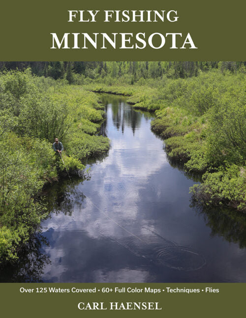 Cover of Fly Fishing Minnesota showing a scenic river surrounded by dense greenery with a person fly fishing on the riverbank, highlighting fishing rods and reels in a natural outdoor setting.