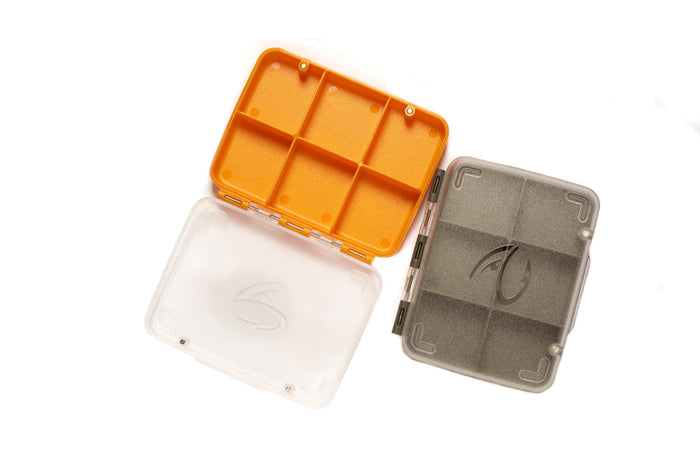 Fulling Mill 6 Compartment Box shown open, featuring clear and orange plastic with six separate compartments for organizing fishing tackle and lures.