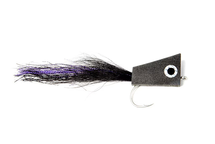Fulling Mill NYAP Popper fishing lure with a black foam head, silver eye detail, and a trailing black and purple feather tail designed for fly fishing and musky tackle.