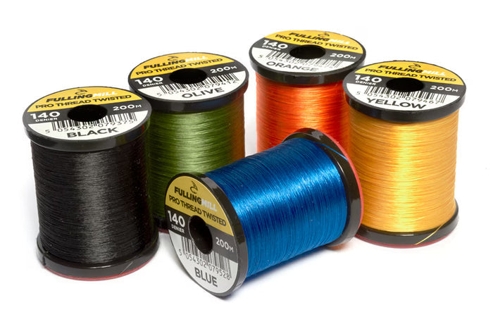 Four spools of Fulling Mill Pro Thread Twisted 140 Den in black, olive, blue, orange, and yellow colors, used for tying fishing lures and tackle.