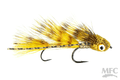 Galloup's Micro Dungeon #10 fly fishing lure featuring yellow and brown feathers, a detailed gold and black head with an eye, and two sharp hooks for musky fishing.