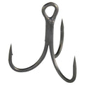 Close-up view of a black metal Gamakatsu G-Finesse MH Treble fishing hook with three sharp points and a reinforced eyelet designed for secure attachment to fishing lures.