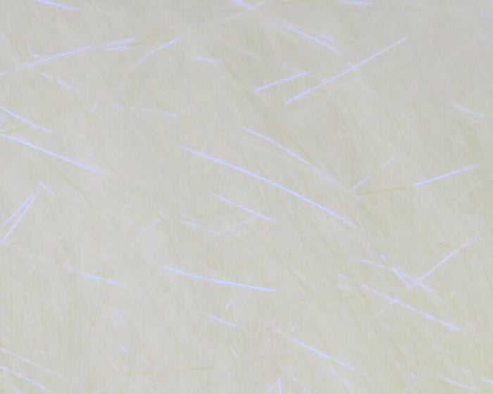 Close-up view of pale, shimmery synthetic fibers with subtle iridescent strands designed for fishing tackle, specifically Hareline Ice Dub Shimmer Fringe material.