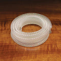 Coiled transparent iridescent tubing with a slightly textured surface, designed for use in fly fishing applications, identified as Hareline Pearl E-Z Body.