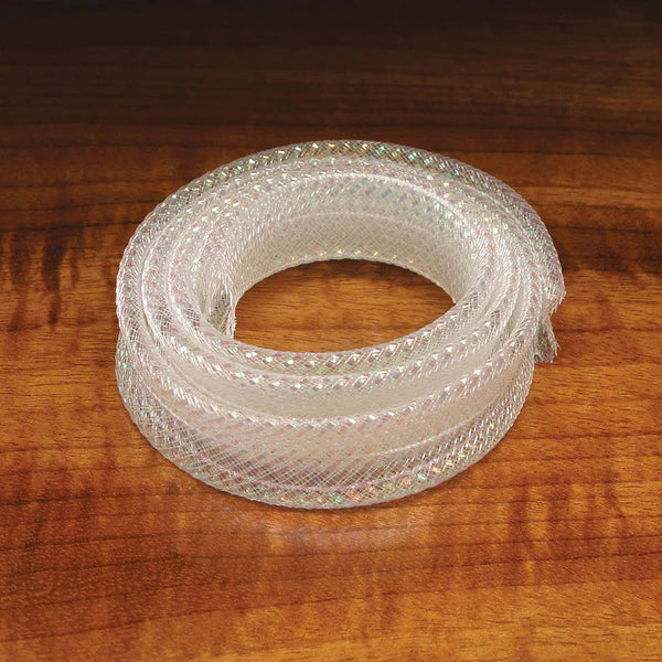 Coiled transparent iridescent tubing with a slightly textured surface, designed for use in fly fishing applications, identified as Hareline Pearl E-Z Body.