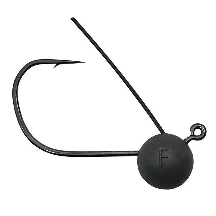 Close-up of a black Hayabusa D-STRIKER Wacky Jig Head featuring a sharp fishing hook, weighted round head with an embossed "F," and an angled weed guard for fishing tackle use.