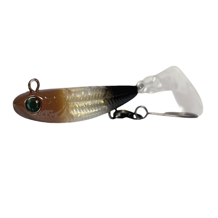 Fishing lure with a brown and black body and green eye on a white background