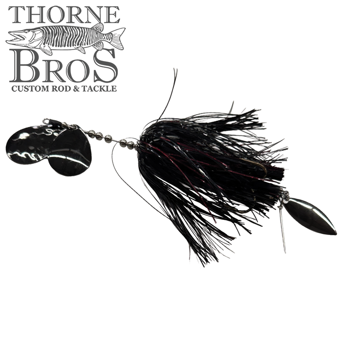 Hunsy Tails 7/8 Banger fishing lure with shiny black skirt, two hammered silver spinner blades, and a weighted silver bullet-shaped head, designed for musky fishing.