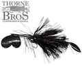 Close-up of a Hunsy Tails 8/10 Banger fishing lure with black and red synthetic fibers and two metallic spinner blades, designed for musky fishing.