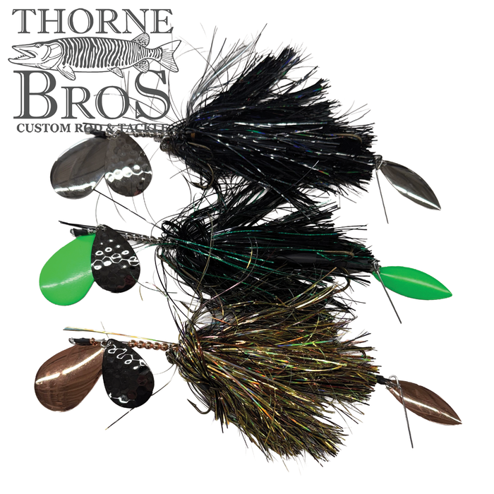 Three Hunsy Tails 8/9 Banger fishing lures with shiny black, green, and brown skirts, each featuring metal spinner blades and hooks designed for musky fishing tackle.