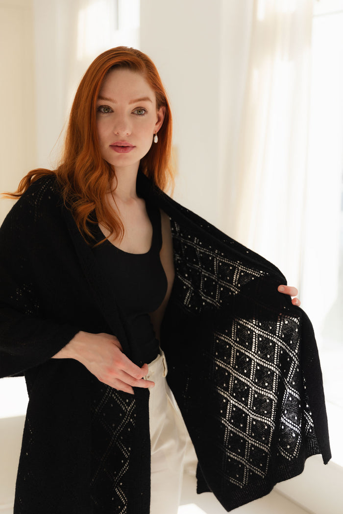 Woman wearing a 100% Mongolian cashmere lace shawl.