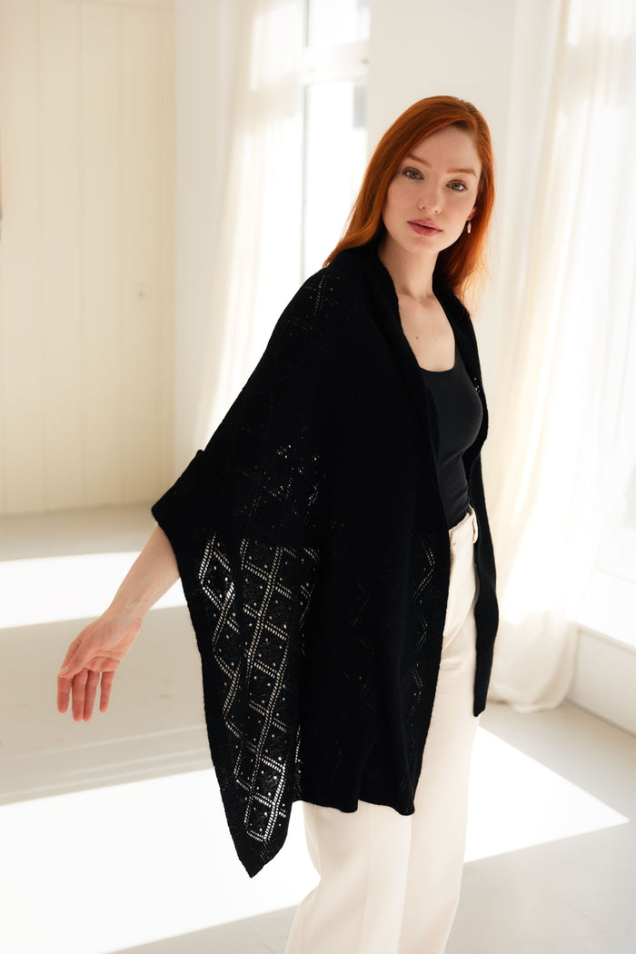 Woman wearing a 100% Mongolian cashmere lace scarf.