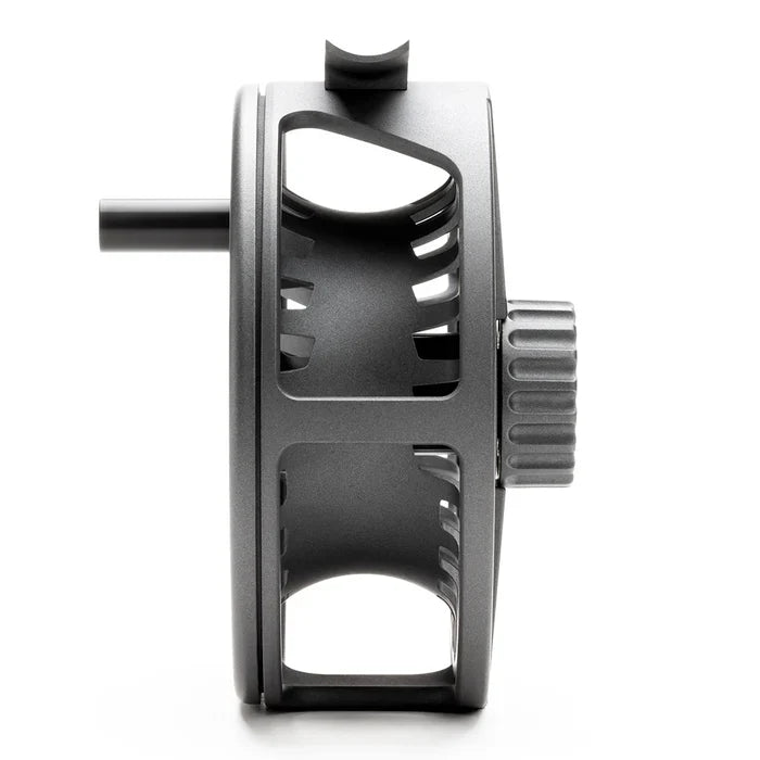 Side view of a sleek, metallic Lamson Liquid S HD fly fishing reel featuring a modern, open-frame design and textured drag adjustment knob for smooth fishing tackle performance.