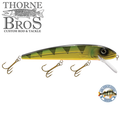 Livingston Lures Squeaky Pete 233 fishing lure in green and yellow with black triangular patterns, featuring three treble hooks and a clear diving lip for freshwater fishing.