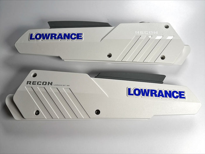 Lowrance Recon Sideplate Kit Saltwater PN:000-16390-001 featuring two white sideplates with blue Lowrance branding, designed for marine electronics and fishing tackle customization.