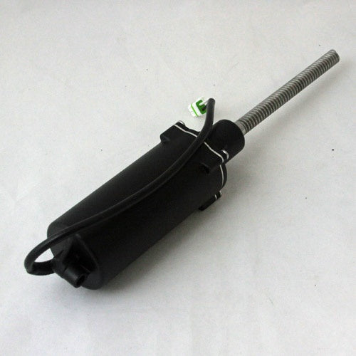Minn Kota ASSEMBLY, TILT MOTOR, (SUB) P/N: 2997813 is a black motor assembly component with a coiled steel shaft and attached wiring, designed for marine electronics applications.