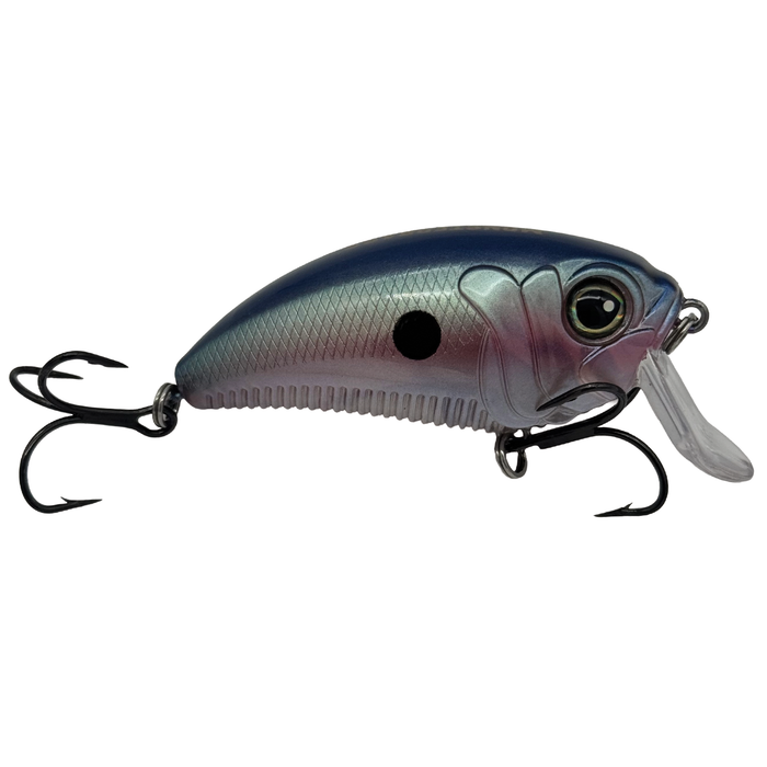 Monsterbass Super Freak fishing lure in blue and silver with black spot, detailed eye, and two treble hooks designed for musky fishing tackle.