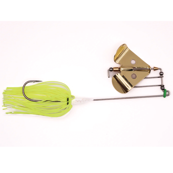Fishing lure with a gold blade on a white background