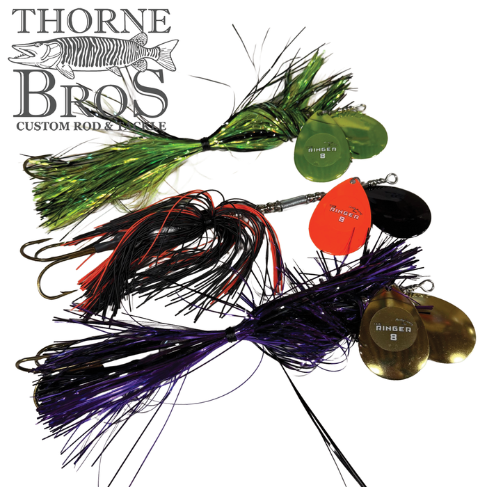 Three Musky Frenzy The Ringer 8 spinnerbaits in green, black with red, and purple with gold colors, featuring hooks and blades designed for musky fishing.