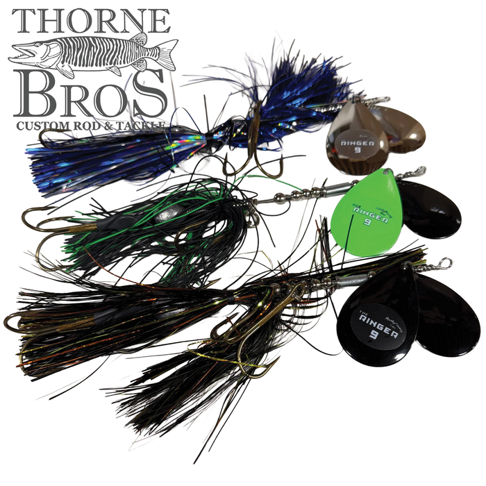 Three Musky Frenzy The Ringer 9 fishing lures with colorful skirts in blue, green, and black, each featuring dual spinner blades and sharp hooks, designed for musky fishing.