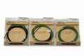 Three packages of OPST Pure Skagit D2 Dual Density Tips in green, each coiled and secured inside clear plastic packaging with cardboard labels, displayed side by side.