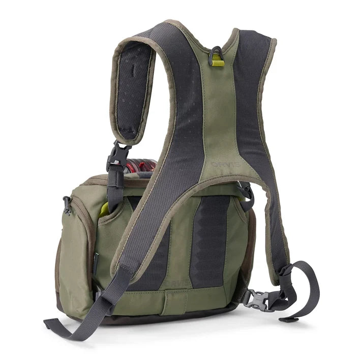 Orvis Chest Pack in olive green with padded shoulder straps, multiple compartments, and adjustable buckle straps designed for convenient fishing tackle organization and carrying.