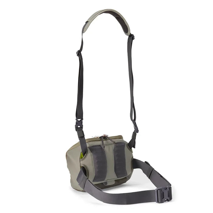 Orvis Chest/Hip Pack in olive green with adjustable shoulder strap waist belt and multiple storage compartments for fishing tackle