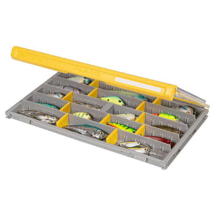Plano EDGE 3700 Thin Box open with multiple compartments holding various colorful fishing lures, designed for organized fishing tackle storage and easy access.