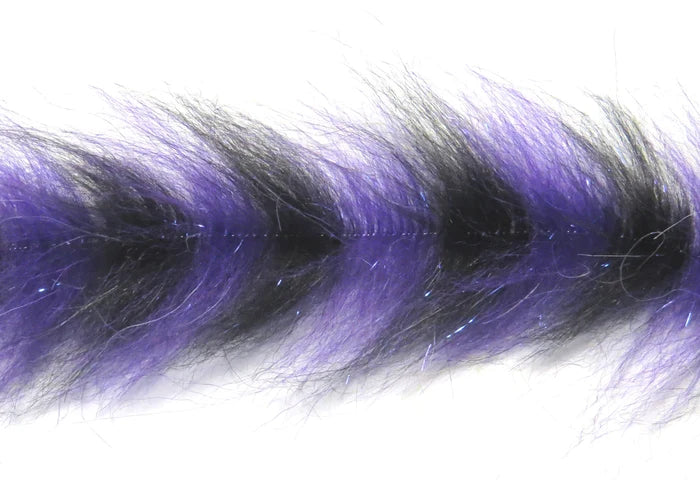 Close-up of a purple and black fibrous fishing lure material designed for crafting the Polar Fiber Streamer Brush, used in fly fishing and other fishing tackle applications.