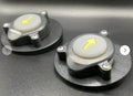 Two round black Precision Sonar Stomp Switch Station for Power Pole and Minn Kota Raptor - Singles PN SWS-SNGL units with yellow arrows on top, designed for marine electronics control.