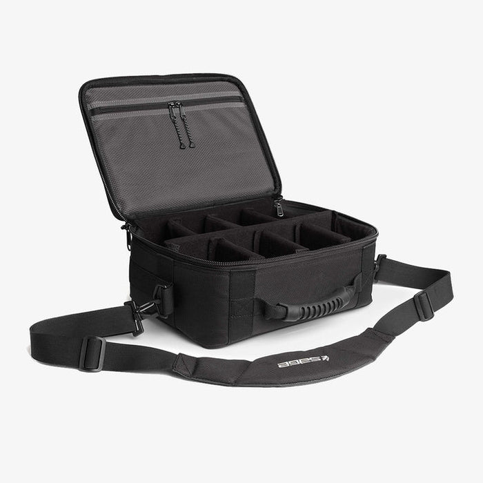 Sage Ballistic Reel Brief open to show multiple padded compartments for organizing fishing reels, made from durable black fabric with a padded adjustable shoulder strap and handle.