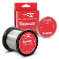Seaguar Red Label Fluorocarbon - Bulk Spools fishing line displayed with red packaging, showing clear, strong, abrasion-resistant fluorocarbon line ideal for fishing tackle.