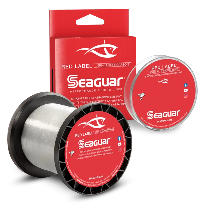 Seaguar Red Label Fluorocarbon - Bulk Spools fishing line displayed with red packaging, showing clear, strong, abrasion-resistant fluorocarbon line ideal for fishing tackle.