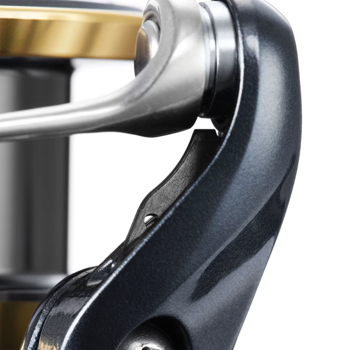 Close-up view of the metallic, dark blue and silver Shimano Ultegra FD fishing reel component showing part of the handle and spool designed for smooth casting and durability.