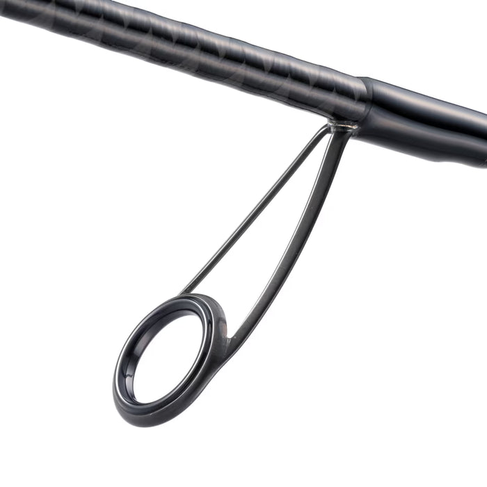 Close-up view of the black fishing rod guide and handle section of the Shimano Zodias B - Spinning rod, showcasing its sleek design and durable construction for fishing tackle.